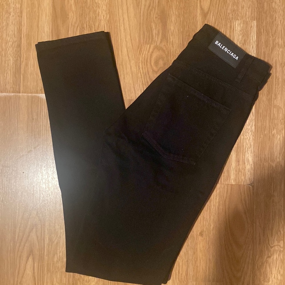 Balenciaga black 5 pocket V waist jeans.